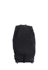 Zaino nero con ruote realizzato in tessuto resistente. Caratterizzato da una forma aerodinamica, spallacci imbottiti e una base robusta con ruote per la mobilità.