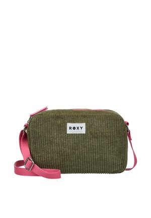 Sac bandoulière rectangulaire en tissu côtelé vert olive avec sangle rose réglable et fermeture éclair, portant l’étiquette ROXY au centre avant.
