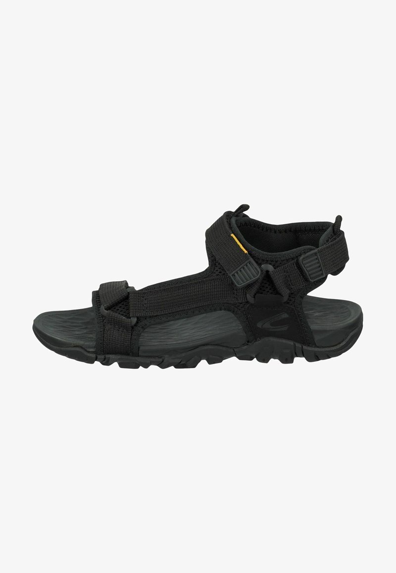 Black outdoor sandals with adjustable straps, textured rubber sole, and padded ankle support. Features plastic buckles and reinforced stitching.