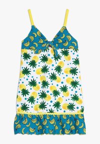 Vestito senza maniche con motivo di frutta tropicale. La parte superiore presenta banane su sfondo turchese, mentre la parte inferiore mostra ananas e pois. Accenti gialli.