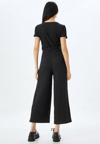Koton V NECK OVERALLS - Jumpsuit - black