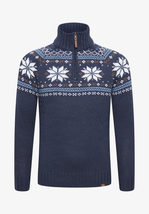Donkerblauwe gebreide trui met hoge kraag, halve rits en een winters thema met een wit en bruin sneeuwvlokpatroon over de borst.