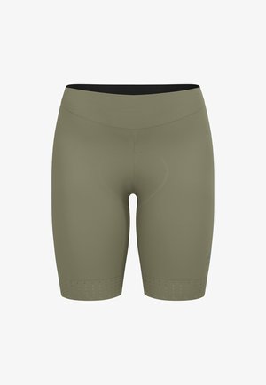 Compressie shorts in olijfgroen, gemaakt van lichtgewicht stof met een hoge tailleband. Bevat geperforeerde accenten aan de zoom.