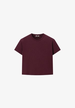T-shirt en coton bordeaux foncé à manches courtes avec col rond et ourlet droit, présenté sur fond blanc.