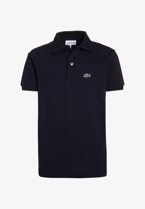 Polo shirt blu navy realizzata in tessuto a trama, con patta a due bottoni e un piccolo logo verde a forma di coccodrillo sul petto.