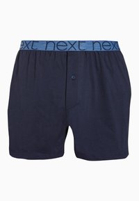 Boxeri din bumbac bleumarin, cu un manson elastic de un albastru deschis, ce prezintă textul "next". Închidere cu buton în față și o textură netedă.