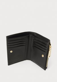 Black leather wallet with multiple card slots, a zippered compartment, and gold-tone hardware accents. Smooth texture with subtle branding.