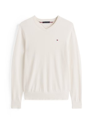 Maglione a V crema realizzato in tessuto morbido. Caratterizzato da maniche lunghe, polsini e orlo a coste, e un piccolo logo sul petto. Design semplice e classico.