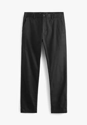 Pantaloni neri realizzati in un materiale liscio, con zip e chiusura a bottone, tasche laterali e vestibilità sartoriale.