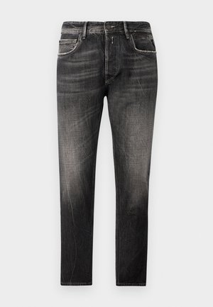 Zwarte denim jeans met een vervaagde wassing, vijf zakken en een recht model. Beschikt over subtiele whiskering en contrasterende stikseldetails.