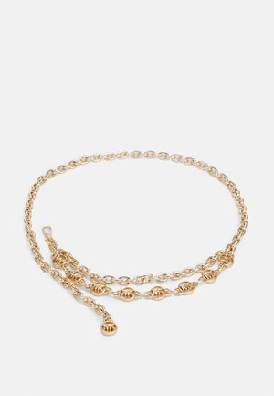 Naszyjnik z łańcuszkiem w złotym odcieniu, ozdobiony małymi, okrągłymi zawieszkami z logo rozmieszczonymi równomiernie na łańcuszku, z zapięciem na karabińczyk.