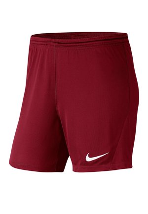 Pantalones cortos deportivos marrones con cintura elástica y logo blanco de Nike Swoosh en la parte inferior izquierda de la pierna sobre un fondo blanco.