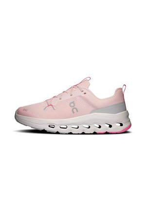 Light pink athletic sneaker with white sole featuring circular cutouts and gray branding on a plain white background.