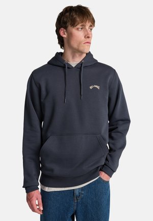 Dark grey hoodie with a front pocket, adjustable drawstrings, and subtle logo embroidered in tan. Soft, smooth texture, standard fit.