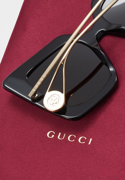 Gucci Occhiali da sole - black/gold-coloured/grey