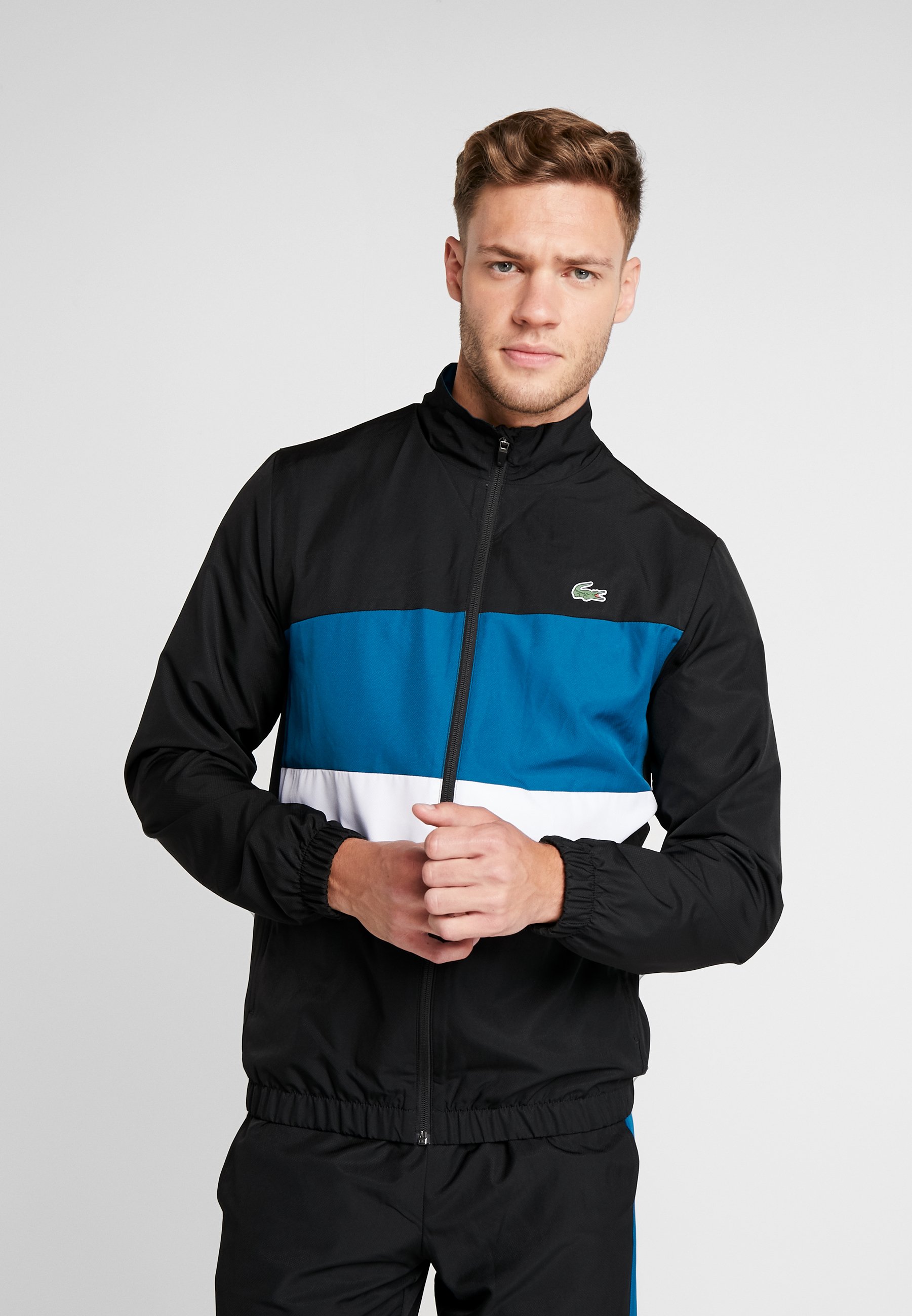 chandal lacoste hombre el corte inglés