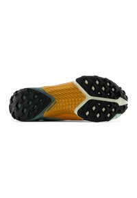 Shoe sole with a textured orange upper, black rubber outsole featuring multidirectional traction, and green accents.