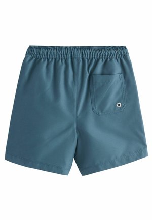 Teal színű fürdőnadrág, elasztikus derékkal, egyhátsó zsebbel és sima textúrával. Egyszerű design, látható minták nélkül.