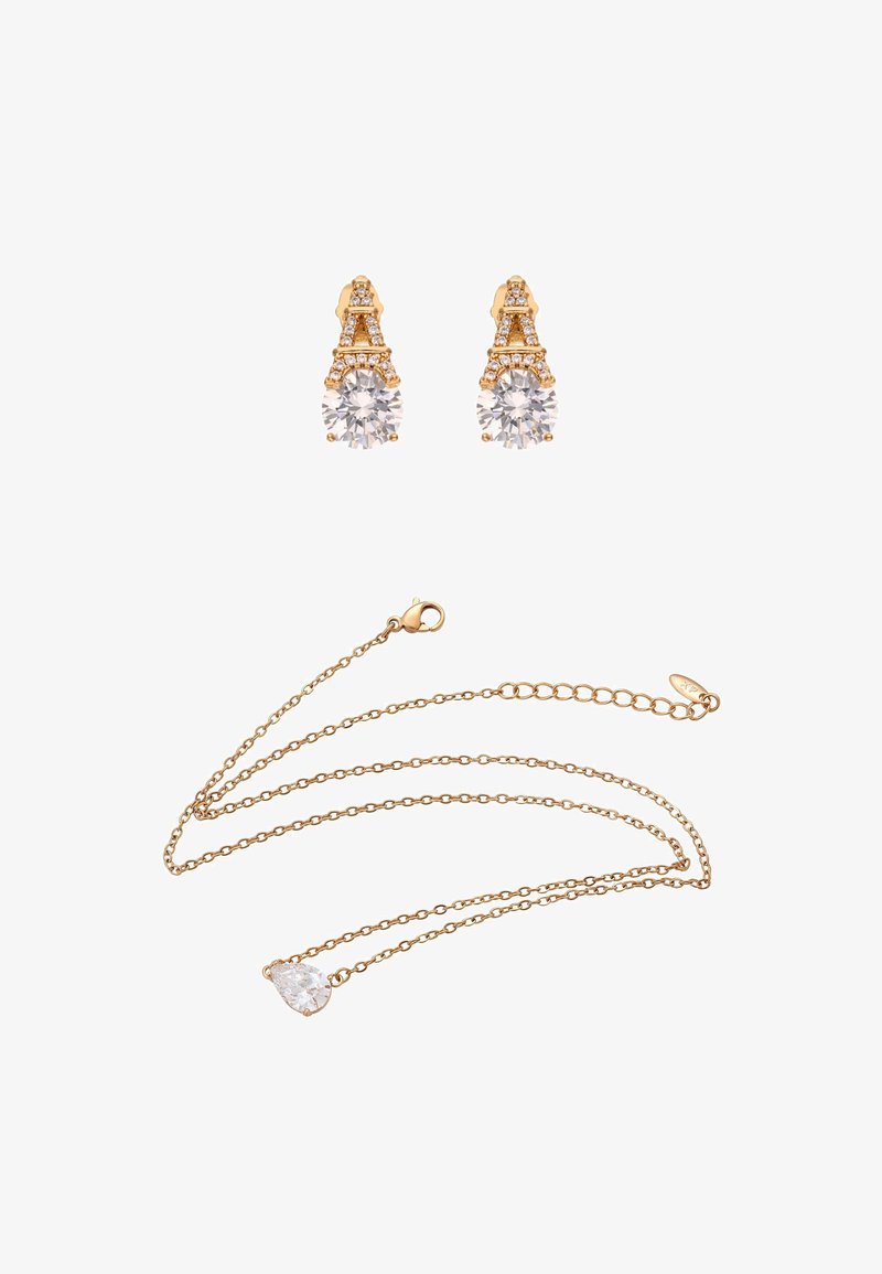 Aranyszínű fülbevalók kerek, tiszta kristályokkal és csatorna-beállítású díszítésekkel. Lánc nyaklánc egyetlen csepp alakú kristály medállal.