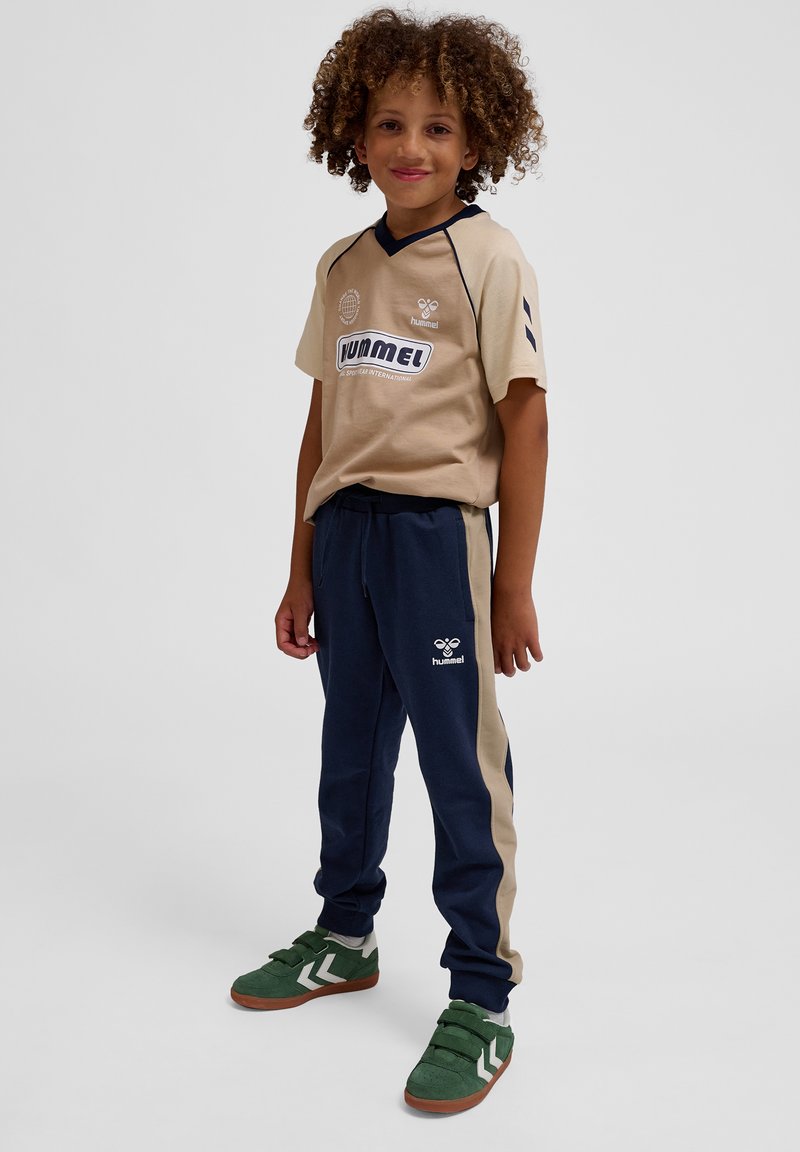 Hummel HMLESSEN - Träningsbyxor - black iris