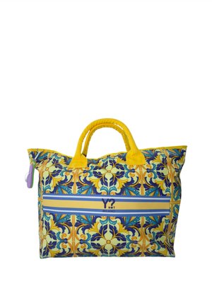 Borsa a tracolla colorata con manici gialli e una fascia a righe blu, gialla e bianca con testo "Y? NOT MILANO".