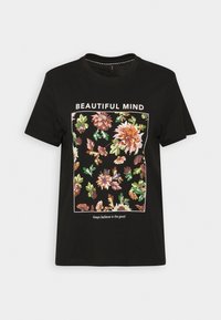 T-shirt noir à manches courtes avec un motif floral coloré à l'intérieur d'un cadre rectangulaire, texte "BEAUTIFUL MIND" au-dessus et "Always believe in the good" en dessous.