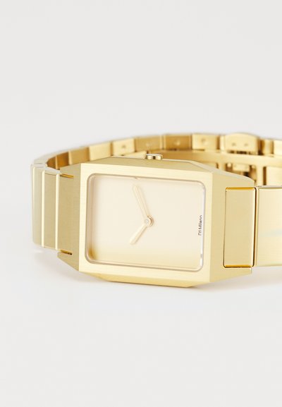 Gold rectangular wristwatch with a minimalist design, featuring a cream-colored face, thin hour and minute hands, and a metal link band.