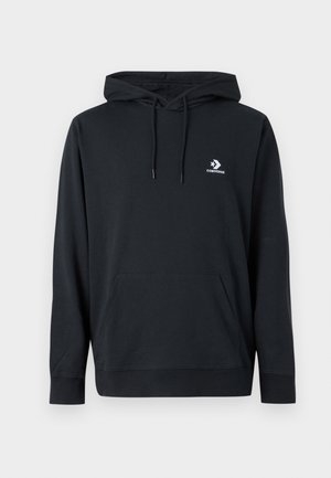 Svart hoodie i bomull med framfickan kangaroo, dragsko i huvan och vitt logotyp på bröstet. Har långa ärmar och ribbade muddar.