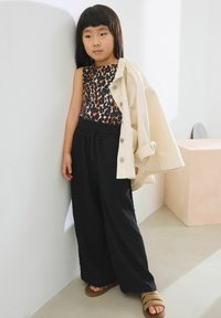 Next RELAXED FIT PRINT  - Trousers - black