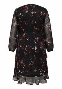 Vestido negro semitransparente de manga larga con un patrón floral abstracto en tonos rojo oscuro y blanco, mostrado desde la parte de atrás.