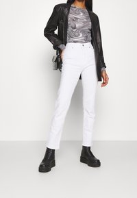 Levi's® Jeans slim fit - white denim