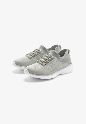 Light gray knitted athletic shoes with a seamless design, lace-up closures, and a white sole. Features textured upper and padded collar.