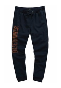 Marinblå joggers med elastisk midja, dragsko och sidofickor. "BASERUNNER" tryckt i brons på vänster ben.