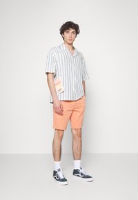 Levi's® Calções - brandied melon