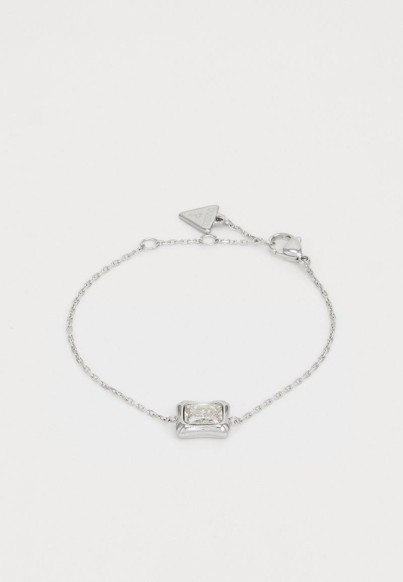 Bracciale in argento con una pietra trasparente di forma rettangolare incastonata in una montatura lucidata. Include lunghezza regolabile con chiusura a gancio.