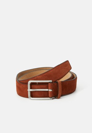 Brown suede belt with a silver metal buckle. Features smooth texture and contrasting stitching along the edges. Classic, minimal design.