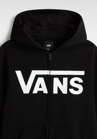 Sweat à capuche noir zippé en tissu doux, avec un grand logo "VANS" blanc sur le devant et une capuche à cordon.