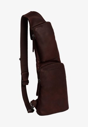 Braune Lederschultertasche mit strukturierter Oberfläche, ausgestattet mit einer Reißverschlusstasche oben und einem zusätzlichen größeren Reißverschlussfach. Verstellbarer Riemen.