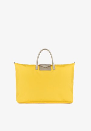 Sac en toile nylon jaune avec une texture lisse, présentant un accent en cuir gris et deux poignées supérieures pour un transport facile.