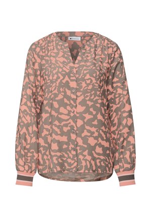 Blouse à manches longues avec col en V, motif abstrait rose et beige, dotée de boutons sur le devant et de manches froncées avec poignets rayés.