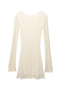 Robe à manches longues en crème clair avec un motif floral texturé. Présente un décolleté en forme de cœur et des manches évasées, se terminant au-dessus de la taille.
