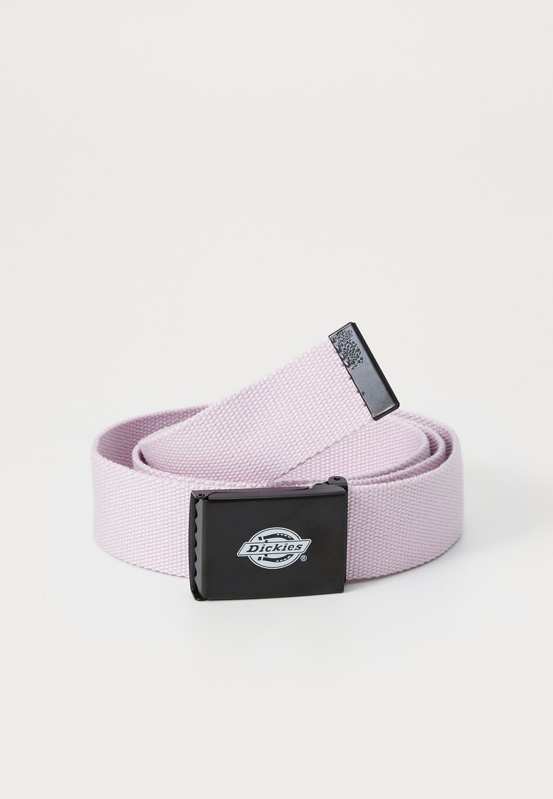 Purple canvas belt featuring a black metal buckle with serrated edges and a logo. The fabric is textured and woven for durability.
