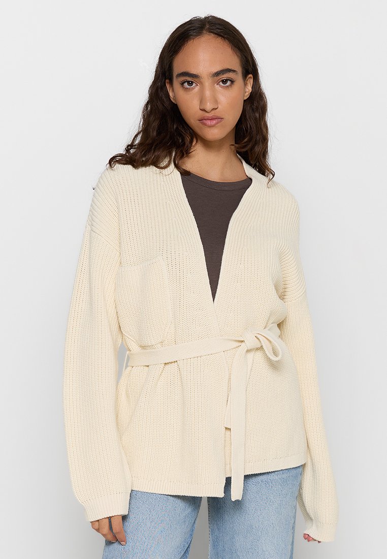 closed Vest geel