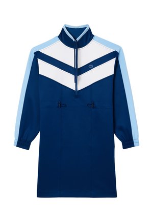 Camiseta de pullover azul marino con cuello alto, diseño de flechas en blanco y azul claro, puños elásticos y toggles ajustables en el dobladillo.