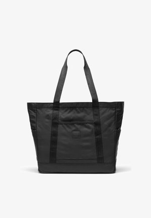 Grand sac fourre-tout noir avec deux bretelles, poche avant et compartiments latéraux, en tissu lisse.