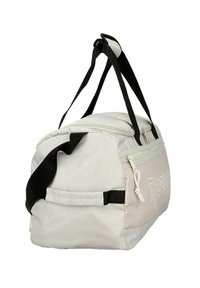 Bolsa deportiva Reebok de color gris claro y rosa pálido con correas negras para el hombro y bolsillo frontal con cremallera.
