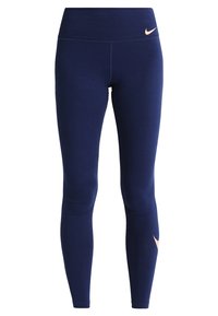 Marinblå heltäckande träningsleggings med hög midja och små rosa Nike-swoosh-loggor på midjan och nedersta delen av benet.