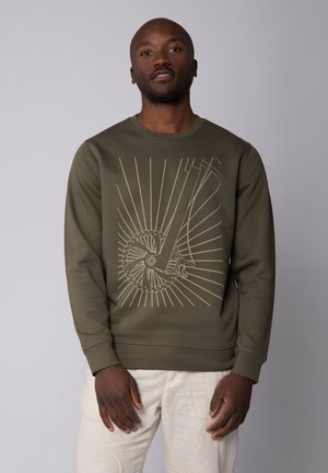 Olive green sweatshirt featuring a graphic of a bicycle wheel and spokes in light beige, with a round neckline and ribbed cuffs.