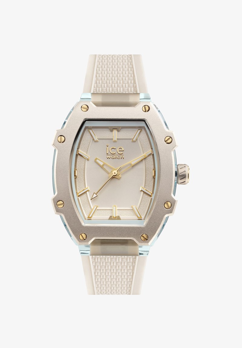 Orologio al quarzo con cinturino in silicone bianco testurizzato, cassa ottagonale argento e quadrante crema. Marcatori e logo in oro ben visibili.