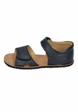 Navy blue leather toddler sandal with adjustable Velcro straps and cork-textured footbed on black rubber sole.